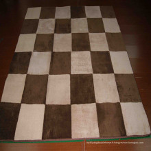 Tapis fausse fourrure de cowhide brun patchwork